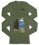 A green long-sleeved t-shirt with a graphic design depicting a mountain landscape with pine trees, a full moon, and clouds. The text on the t-shirt reads "GREAT SMOKY MOUNTAINS NATIONAL PARK".