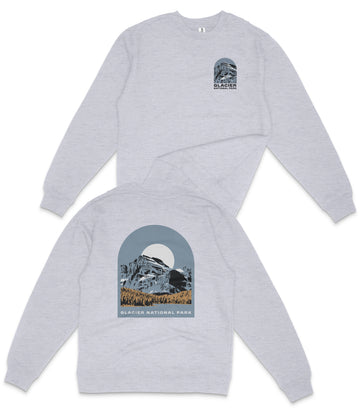 A gray sweatshirt with a graphic design depicting a mountain landscape and the text "Glacier National Park" printed on the back.