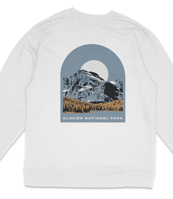 A white long-sleeved shirt with a graphic design depicting a mountain landscape with a large moon in the sky.