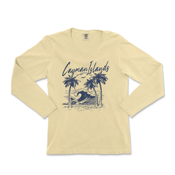 a women's long sleeve shirt with a graphic of a surfer on a wave
