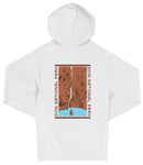 A white hooded sweatshirt with a graphic design depicting a waterfall and a person standing in the water.