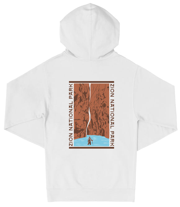 A white hooded sweatshirt with a graphic design depicting a waterfall and a person standing in the water.