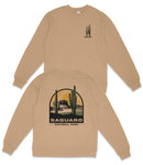a tan sweatshirt with a graphic design depicting a desert landscape with cacti and mountains, along with the text "Saguaro National Park".