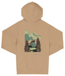 A beige hooded sweatshirt with a graphic design depicting a scenic landscape with pine trees, mountains, and a cloudy sky.