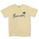 a t - shirt with a palm tree in the background