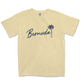 a t - shirt with a palm tree in the background