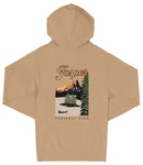 A beige hooded sweatshirt with a graphic design depicting a scenic landscape with mountains, pine trees, and a small boat on a lake.