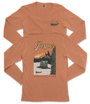 a long-sleeved orange t-shirt with a graphic design depicting a scenic landscape with mountains, a lake, and a canoe.