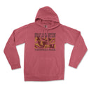 a pink hoodie with a picture of a bird on it
