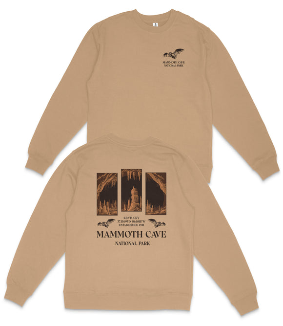 a beige sweatshirt with a graphic design on the back, depicting a cave with bats. The design includes text that reads "MAMMOTH CAVE NATIONAL PARK" and "KENTUCKY 7,859.9 N WEST 67,639.9 S WEST".