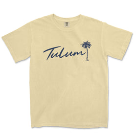 a yellow t - shirt with a palm tree on it