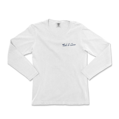 a white long - sleeved shirt with a blue embroidered logo