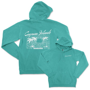 a green sweatshirt with a picture of a beach and palm trees