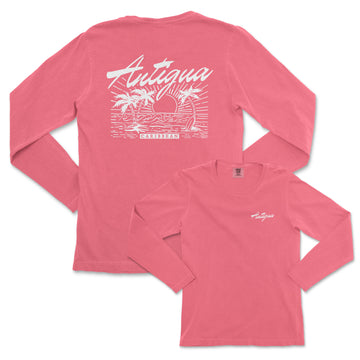 a women's pink long sleeve shirt with a picture of a sunset and palm
