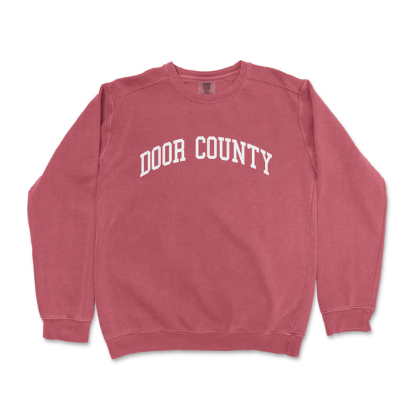 a red sweatshirt with the word door county on it