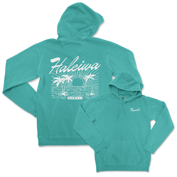 a turquoise hoodie with the words kauauau on it