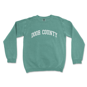 a green sweatshirt with the words door county on it