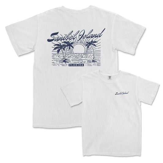 a white t - shirt with a sunset and palm trees on it