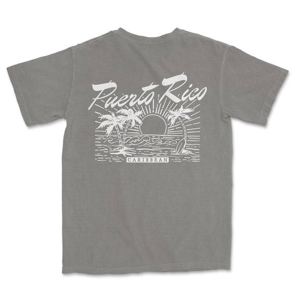 a gray t - shirt with a sunset and palm trees on it