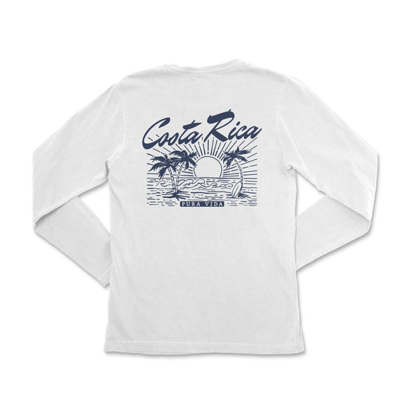 a white long - sleeved shirt with a sunset and palm trees on it