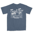 a blue t - shirt with a picture of a boat and palm trees
