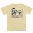 a t - shirt with a picture of a beach and palm trees