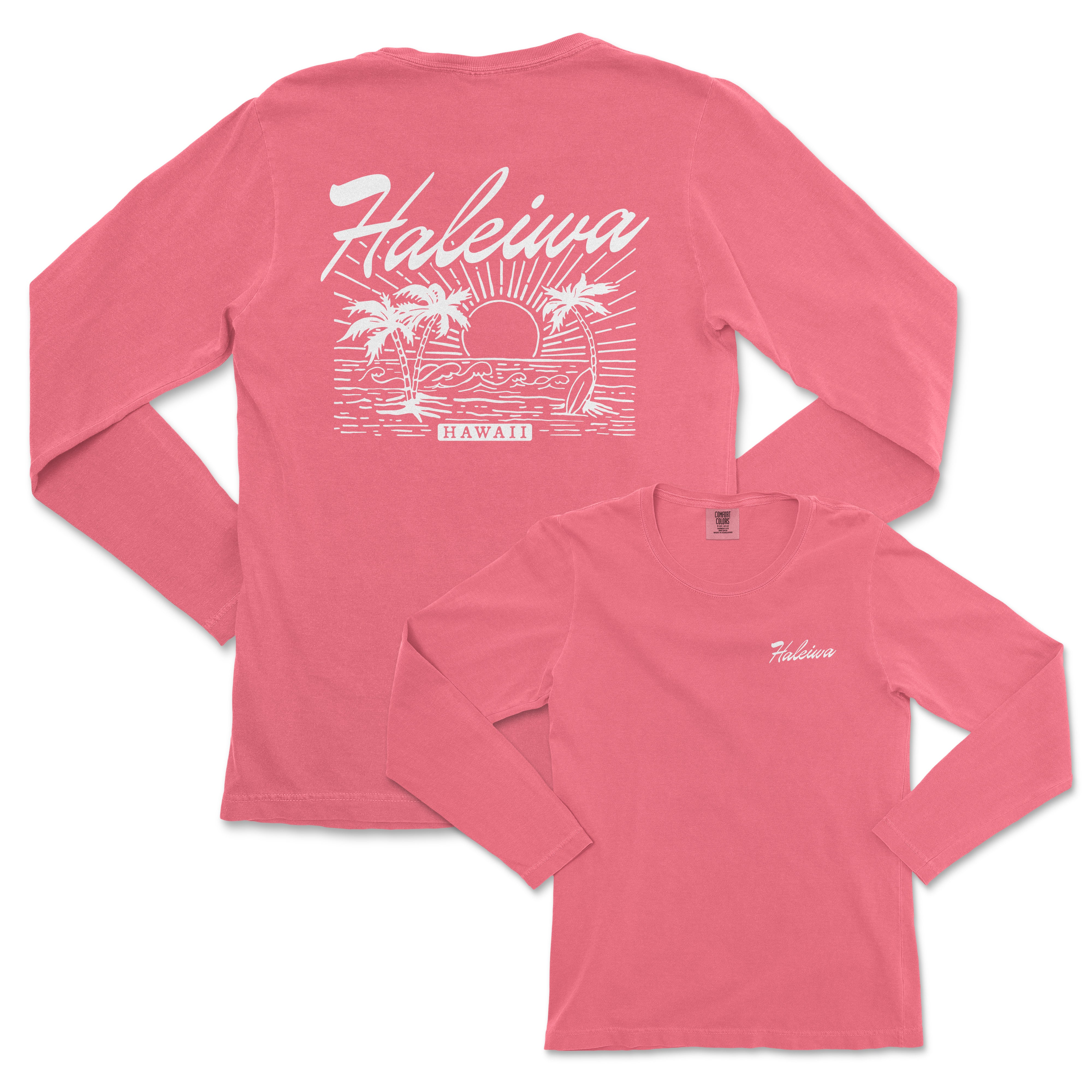 a pink long sleeve shirt with a picture of a boat and palm trees