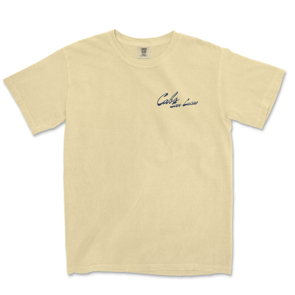 a yellow t - shirt with a small blue logo on the chest