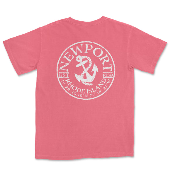 a pink t - shirt with an anchor on the front