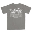 a gray t - shirt with a picture of a beach scene