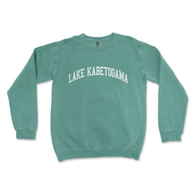 a green sweatshirt with the words lake kabetogama printed on it